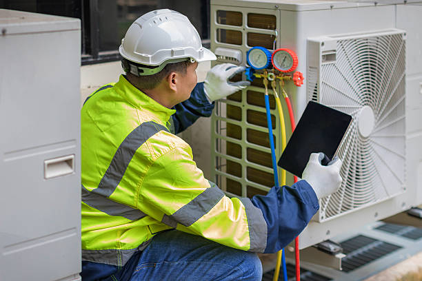 Professional Hvac technician working in Milton, MA